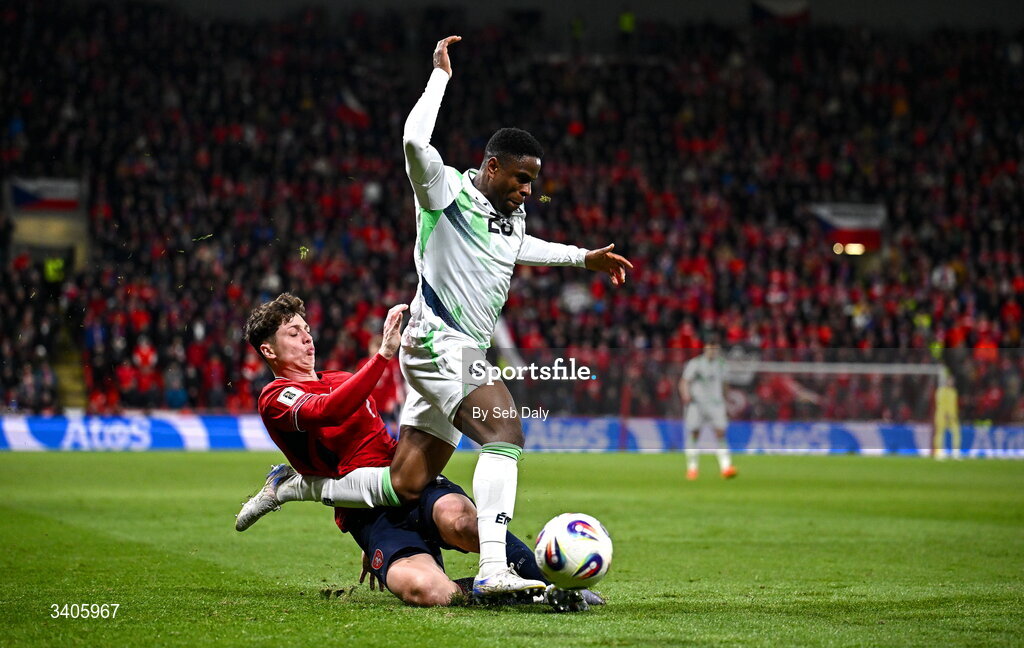 26 March 2026; Chiedozie Ogbene of Republic of Ireland in action against Ladislav Krejcí of Czechia during the FIFA World Cup 2026 European Qualifiers play-off semi-final match between Czechia and Republic of Ireland at Fortuna Arena in Prague, Czechia. Photo by Seb Daly/Sportsfile