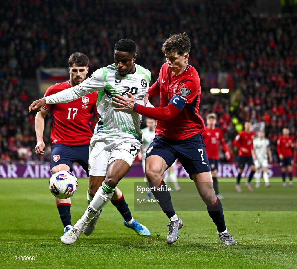 26 March 2026; Chiedozie Ogbene of Republic of Ireland in action against Ladislav Krejcí of Czechia during the FIFA World Cup 2026 European Qualifiers play-off semi-final match between Czechia and Republic of Ireland at Fortuna Arena in Prague, Czechia. Photo by Seb Daly/Sportsfile