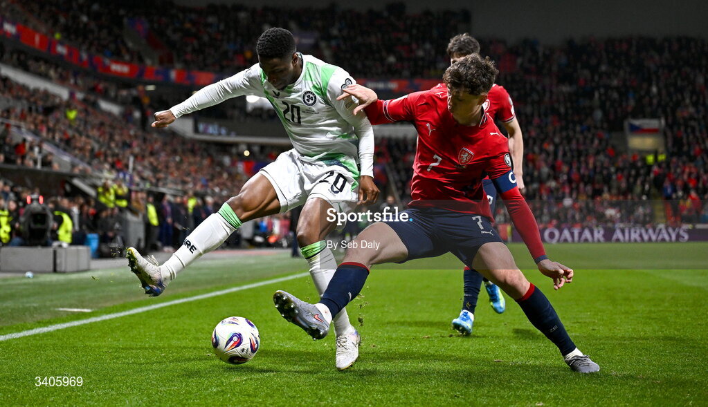 26 March 2026; Chiedozie Ogbene of Republic of Ireland in action against Ladislav Krejcí of Czechia during the FIFA World Cup 2026 European Qualifiers play-off semi-final match between Czechia and Republic of Ireland at Fortuna Arena in Prague, Czechia. Photo by Seb Daly/Sportsfile