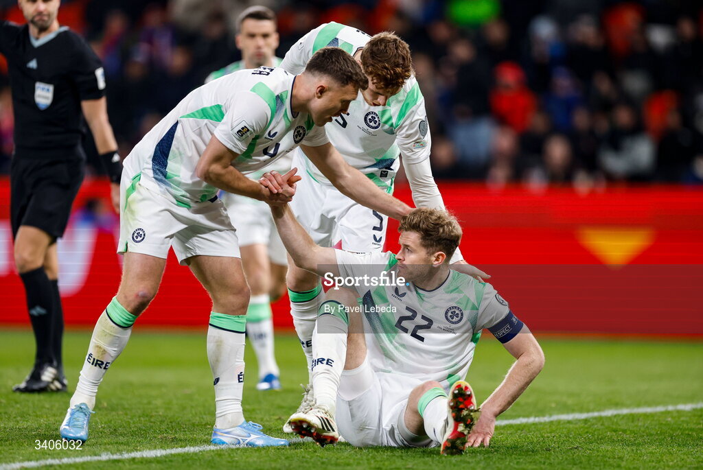 26 March 2026; Nathan Collins of Republic of Ireland, right, with teammates Dara O'Shea, left, and Jake O'Brien during the FIFA World Cup 2026 European Qualifiers play-off semi-final match between Czechia and Republic of Ireland at Fortuna Arena in Prague, Czechia. Photo by Pavel Lebeda/Sportsfile