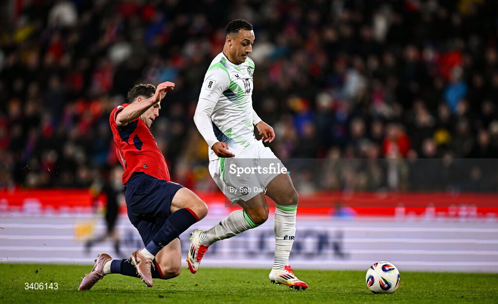 26 March 2026; Adam Idah of Republic of Ireland is tackled by Robin Hranác of Czechia during the FIFA World Cup 2026 European Qualifiers play-off semi-final match between Czechia and Republic of Ireland at Fortuna Arena in Prague, Czechia. Photo by Seb Daly/Sportsfile
