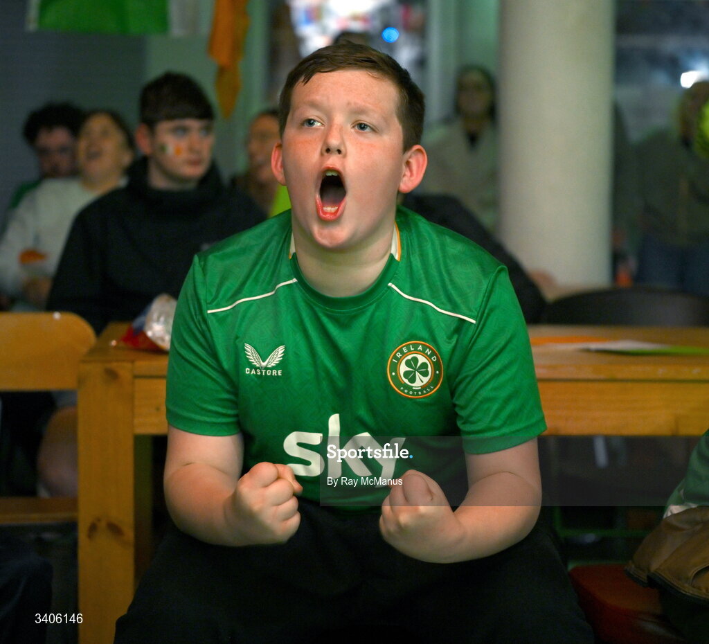 26 March 2026; Republic of Ireland supporter Jessie Loj reacts as he watches the FIFA World Cup 2026 European Qualifiers play-off semi-final match between Czechia and Republic of Ireland at Fortuna Arena in Prague, Czechia, on a giant screen in O'Connell Secondary School, North Circular Road in Dublin. Photo by Ray McManus/Sportsfile