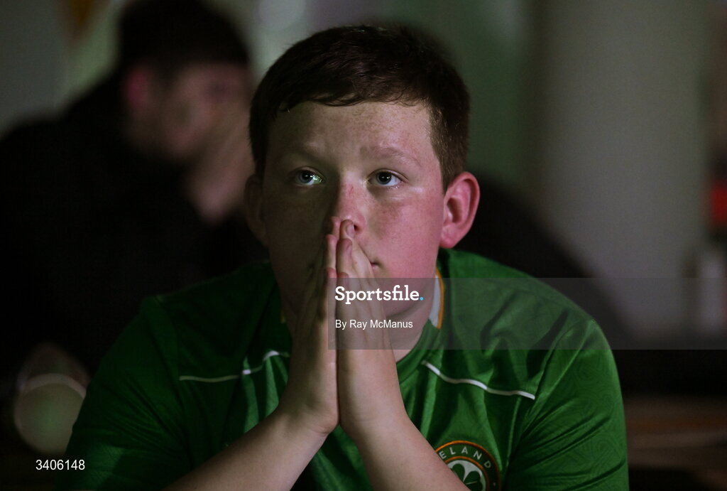 26 March 2026; Republic of Ireland supporter Jessie Loj reacts as he watches the FIFA World Cup 2026 European Qualifiers play-off semi-final match between Czechia and Republic of Ireland at Fortuna Arena in Prague, Czechia, on a giant screen in O'Connell Secondary School, North Circular Road in Dublin. Photo by Ray McManus/Sportsfile