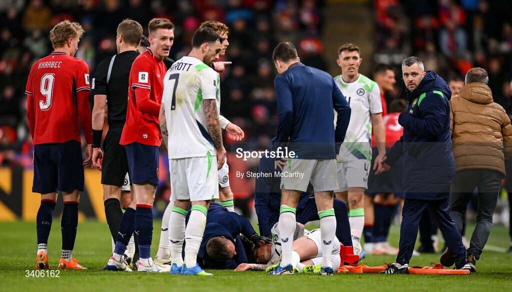 26 March 2026; Sammie Szmodics of Republic of Ireland is treated for a head injury during the FIFA World Cup 2026 European Qualifiers play-off semi-final match between Czechia and Republic of Ireland at Fortuna Arena in Prague, Czechia. Photo by Stephen McCarthy/Sportsfile