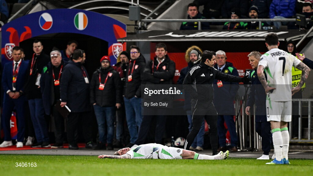 26 March 2026; Sammie Szmodics of Republic of Ireland falls to ground with a head injury during the FIFA World Cup 2026 European Qualifiers play-off semi-final match between Czechia and Republic of Ireland at Fortuna Arena in Prague, Czechia. Photo by Seb Daly/Sportsfile