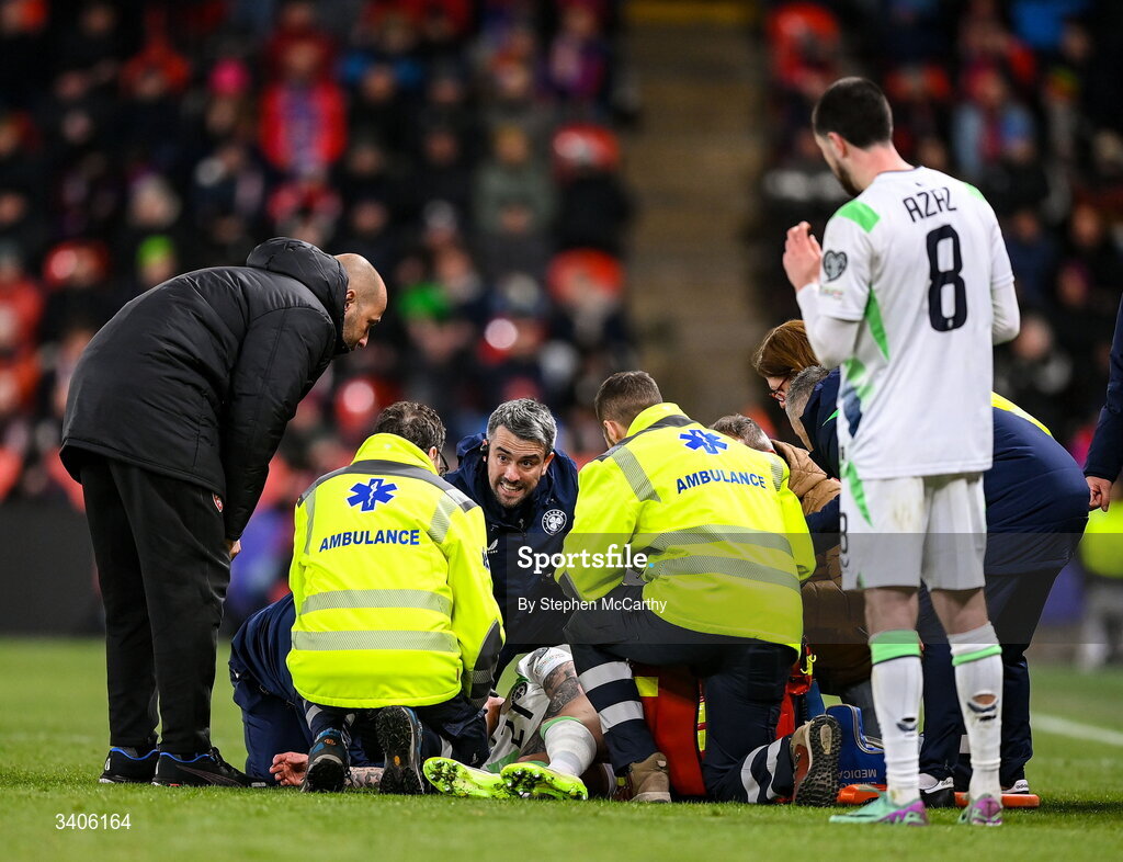 26 March 2026; Sammie Szmodics of Republic of Ireland receives medical attention during the FIFA World Cup 2026 European Qualifiers play-off semi-final match between Czechia and Republic of Ireland at Fortuna Arena in Prague, Czechia. Photo by Stephen McCarthy/Sportsfile