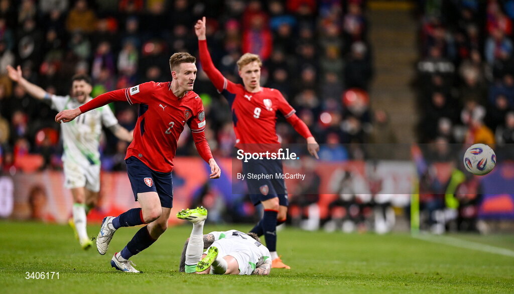 26 March 2026; Sammie Szmodics of Republic of Ireland goes to ground with a head injury during the FIFA World Cup 2026 European Qualifiers play-off semi-final match between Czechia and Republic of Ireland at Fortuna Arena in Prague, Czechia. Photo by Stephen McCarthy/Sportsfile