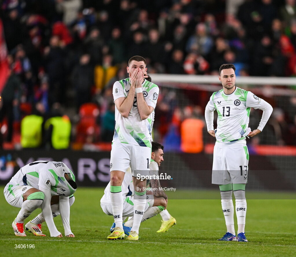 26 March 2026; Republic of Ireland players including Jimmy Dunne, centre, and Harvey Vale, 13, react after losing in the penalty shootout during the FIFA World Cup 2026 European Qualifiers play-off semi-final match between Czechia and Republic of Ireland at Fortuna Arena in Prague, Czechia. Photo by Stephen McCarthy/Sportsfile