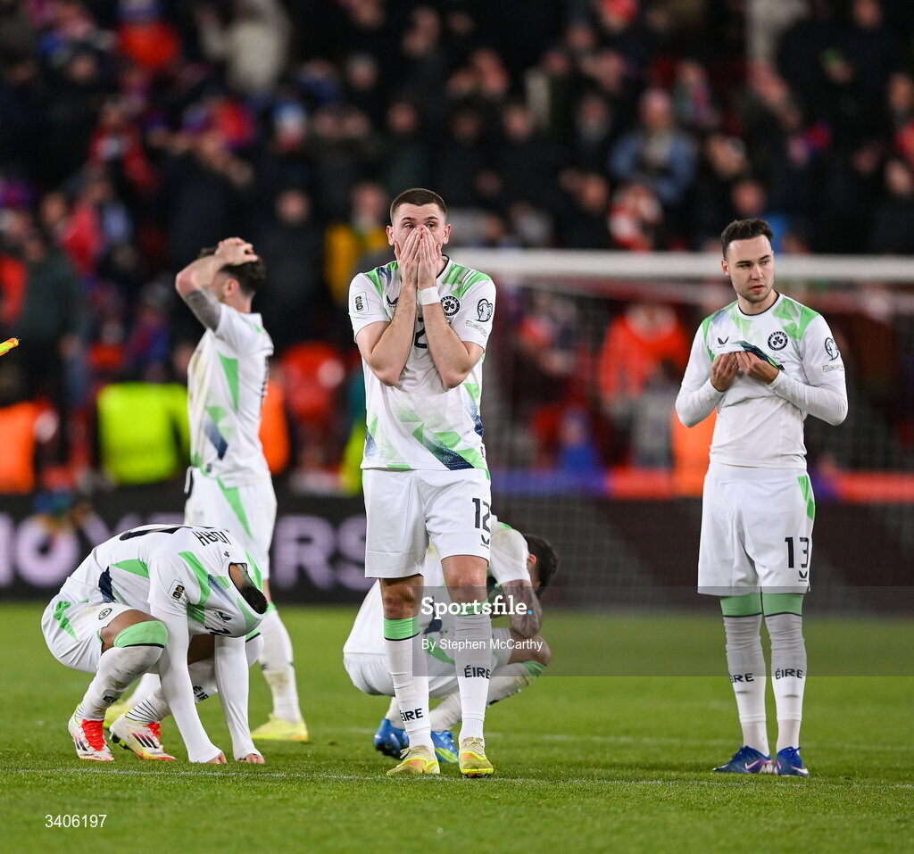 26 March 2026; Republic of Ireland players including Jimmy Dunne, 12, react after losing in the penalty shootout during the FIFA World Cup 2026 European Qualifiers play-off semi-final match between Czechia and Republic of Ireland at Fortuna Arena in Prague, Czechia. Photo by Stephen McCarthy/Sportsfile
