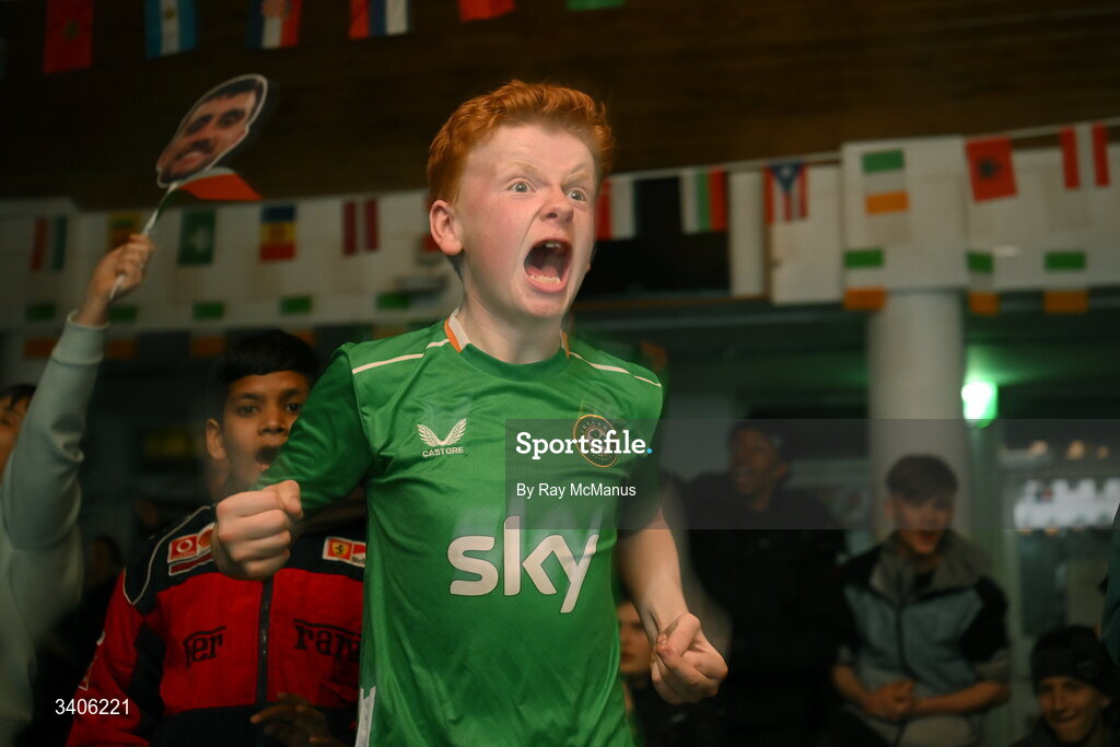 26 March 2026; Republic of Ireland supporter Cameron Kinsella reacts as he watches the FIFA World Cup 2026 European Qualifiers play-off semi-final match between Czechia and Republic of Ireland at Fortuna Arena in Prague, Czechia, on a giant screen in O'Connell Secondary School, North Circular Road in Dublin. Photo by Ray McManus/Sportsfile