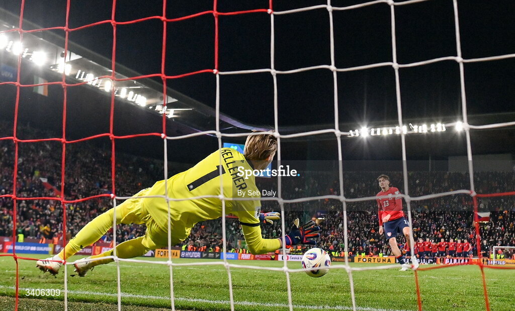 26 March 2026; Republic of Ireland goalkeeper Caoimhin Kelleher saves the penalty of Mojmír Chytil of Czechia in the penalty shoot out during the FIFA World Cup 2026 European Qualifiers play-off semi-final match between Czechia and Republic of Ireland at Fortuna Arena in Prague, Czechia. Photo by Seb Daly/Sportsfile