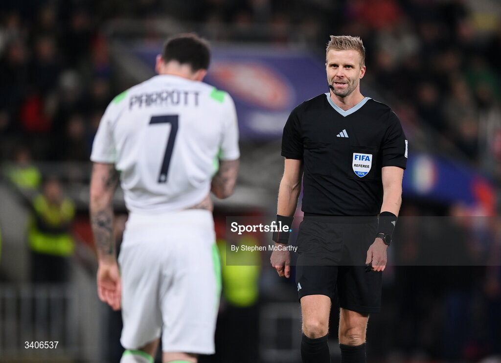 26 March 2026; Referee Glenn Nyberg and Troy Parrott of Republic of Ireland during the FIFA World Cup 2026 European Qualifiers play-off semi-final match between Czechia and Republic of Ireland at Fortuna Arena in Prague, Czechia. Photo by Stephen McCarthy/Sportsfile