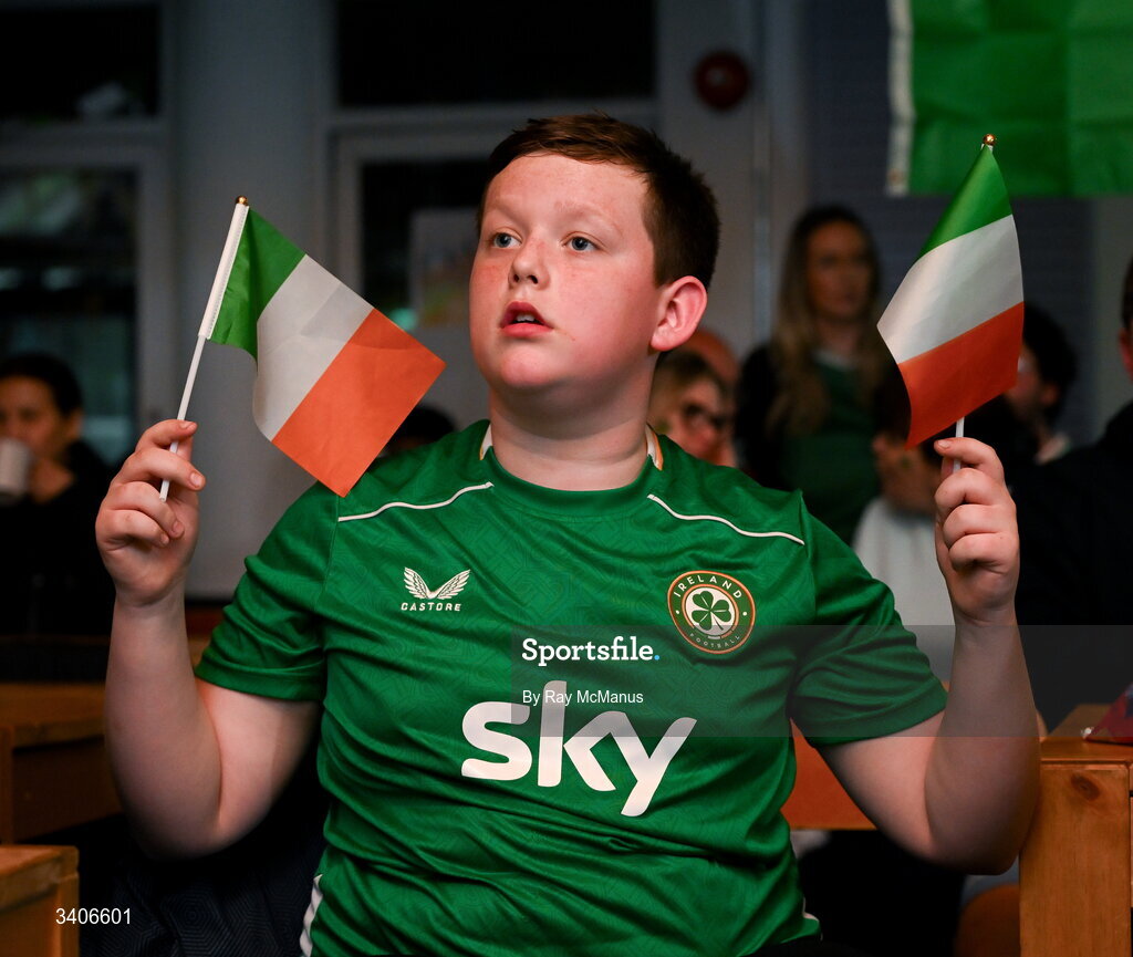 26 March 2026; Republic of Ireland supporter Jessie Loj reacts as he watches the FIFA World Cup 2026 European Qualifiers play-off semi-final match between Czechia and Republic of Ireland at Fortuna Arena in Prague, Czechia, on a giant screen in O'Connell Secondary School, North Circular Road in Dublin. Photo by Ray McManus/Sportsfile