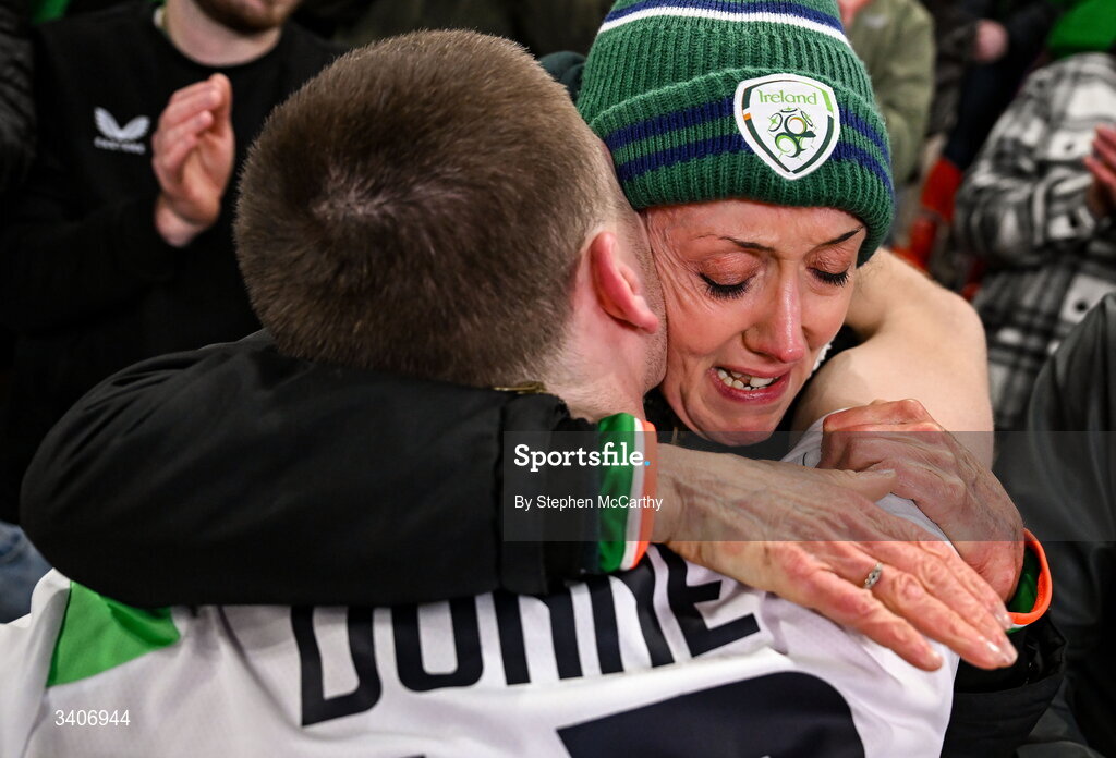 26 March 2026; Republic of Ireland's Jimmy Dunne is consoled by his mother Sharon following their penalty shootout defeat in the FIFA World Cup 2026 European Qualifiers play-off semi-final match between Czechia and Republic of Ireland at Fortuna Arena in Prague, Czechia. Photo by Stephen McCarthy/Sportsfile