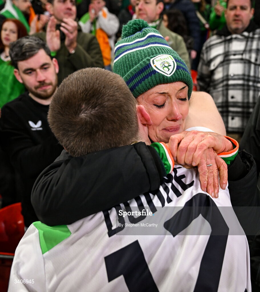 26 March 2026; Republic of Ireland's Jimmy Dunne is consoled by his mother Sharon following their penalty shootout defeat in the FIFA World Cup 2026 European Qualifiers play-off semi-final match between Czechia and Republic of Ireland at Fortuna Arena in Prague, Czechia. Photo by Stephen McCarthy/Sportsfile