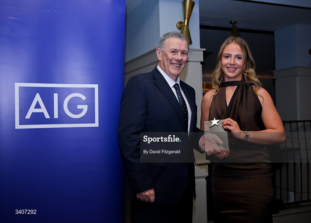 27 March 2026; Caoimhe McCabe of TUS Midwest is presented with her 2026 AIG HEC Rising Stars award by Seán Fleming, Chairperson Ladies HEC at the 2026 AIG HEC All-Stars and Rising Stars evening, at the Dublin Bonnington Hotel. Photo by David Fitzgerald/Sportsfile