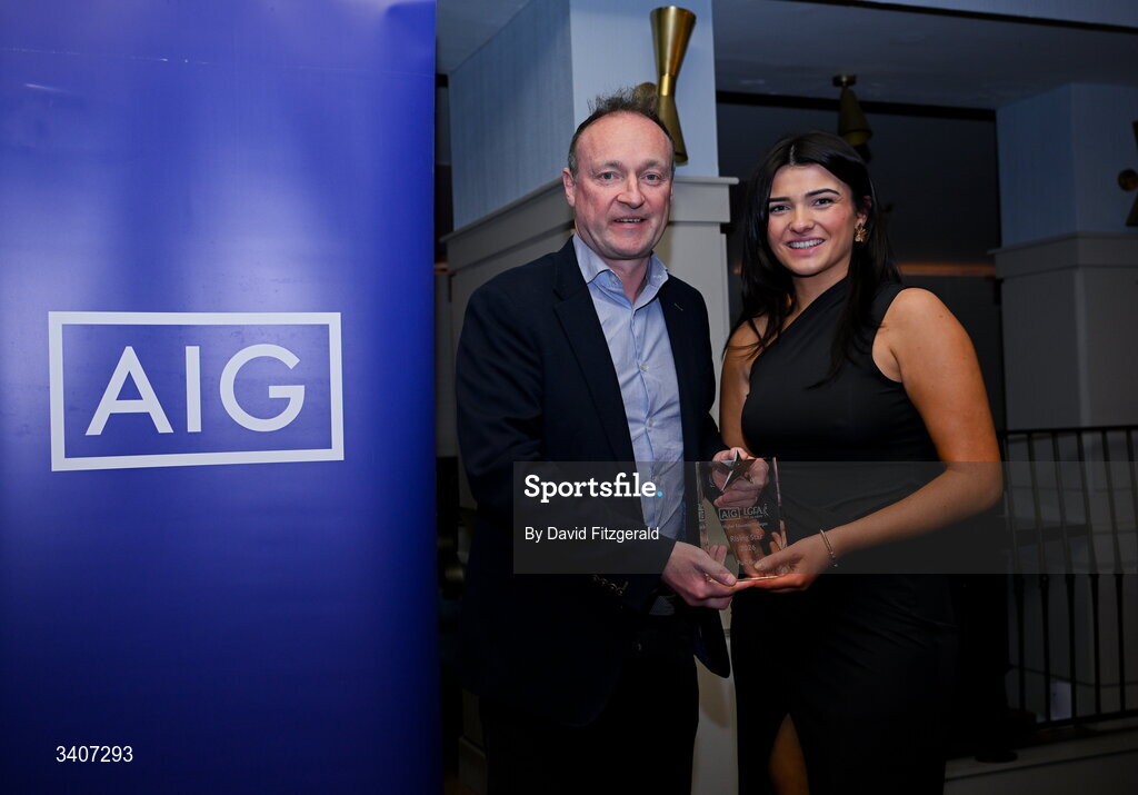 27 March 2026; Grace Moore SETU Carlow is presented with her 2026 AIG HEC Rising Stars award by John Gillick, Head of Consumer Marketing and Sponsorship, AIG Ireland, at the 2026 AIG HEC All-Stars and Rising Stars evening, at the Dublin Bonnington Hotel. Photo by David Fitzgerald/Sportsfile