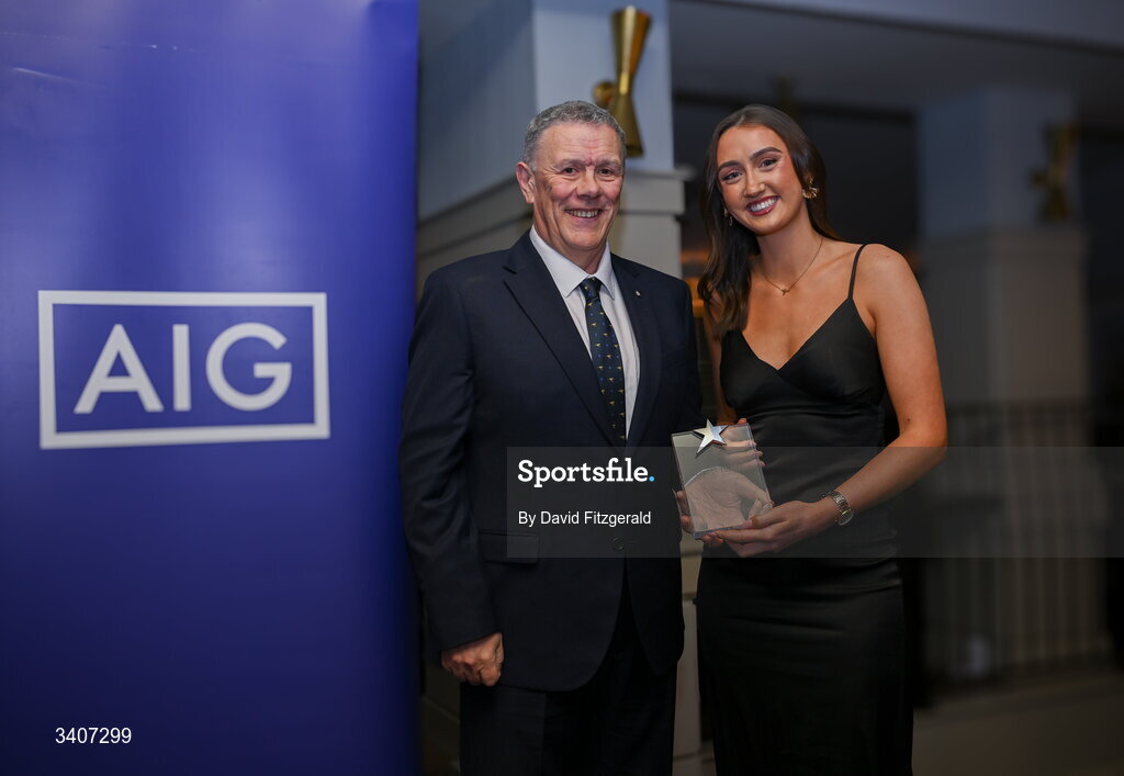 27 March 2026; Ciara Nyland of ATU Galway is presented with her 2026 AIG HEC Rising Stars award by Seán Fleming, Chairperson Ladies HEC at the 2026 AIG HEC All-Stars and Rising Stars evening, at the Dublin Bonnington Hotel. Photo by David Fitzgerald/Sportsfile