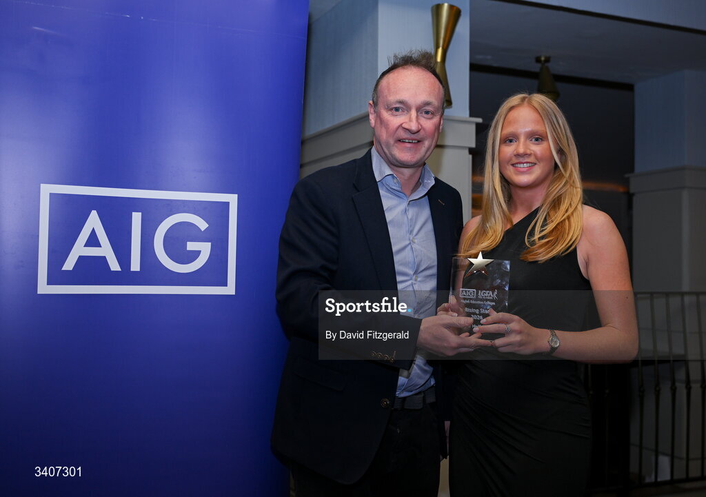 27 March 2026; Sofia Kerr of SETU Carlow is presented with her 2026 AIG HEC Rising Stars award by John Gillick, Head of Consumer Marketing and Sponsorship, AIG Ireland, at the 2026 AIG HEC All-Stars and Rising Stars evening, at the Dublin Bonnington Hotel. Photo by David Fitzgerald/Sportsfile