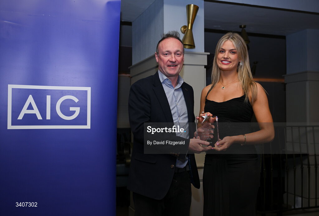 27 March 2026; Sive Byrne of ATU Galway is presented with her 2026 AIG HEC Rising Stars award by John Gillick, Head of Consumer Marketing and Sponsorship, AIG Ireland, at the 2026 AIG HEC All-Stars and Rising Stars evening, at the Dublin Bonnington Hotel. Photo by David Fitzgerald/Sportsfile