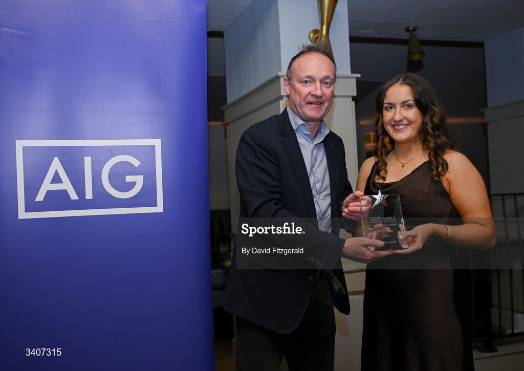 27 March 2026; Leah Conway of Coventry University is presented with her 2026 AIG HEC Rising Stars award by John Gillick, Head of Consumer Marketing and Sponsorship, AIG Ireland, at the 2026 AIG HEC All-Stars and Rising Stars evening, at the Dublin Bonnington Hotel. Photo by David Fitzgerald/Sportsfile