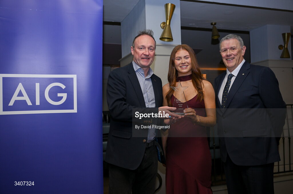 27 March 2026; Ciara Smyth of TUD is presented with her 2026 AIG HEC All Star award by Seán Fleming, Chairperson Ladies HEC and John Gillick, Head of Consumer Marketing and Sponsorship, AIG Ireland, at the 2026 AIG HEC All-Stars and Rising Stars evening, at the Dublin Bonnington Hotel. Photo by David Fitzgerald/Sportsfile
