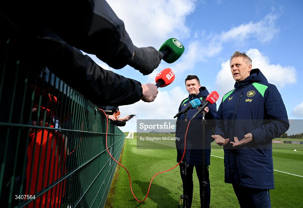 28 March 2026; Head coach Heimir Hallgrimsson speaks to media, accompanied by communications manager Kieran Crowley before a Republic of Ireland men's training session at the FAI National Training Centre in Abbotstown, Dublin. Photo by Stephen McCarthy/Sportsfile