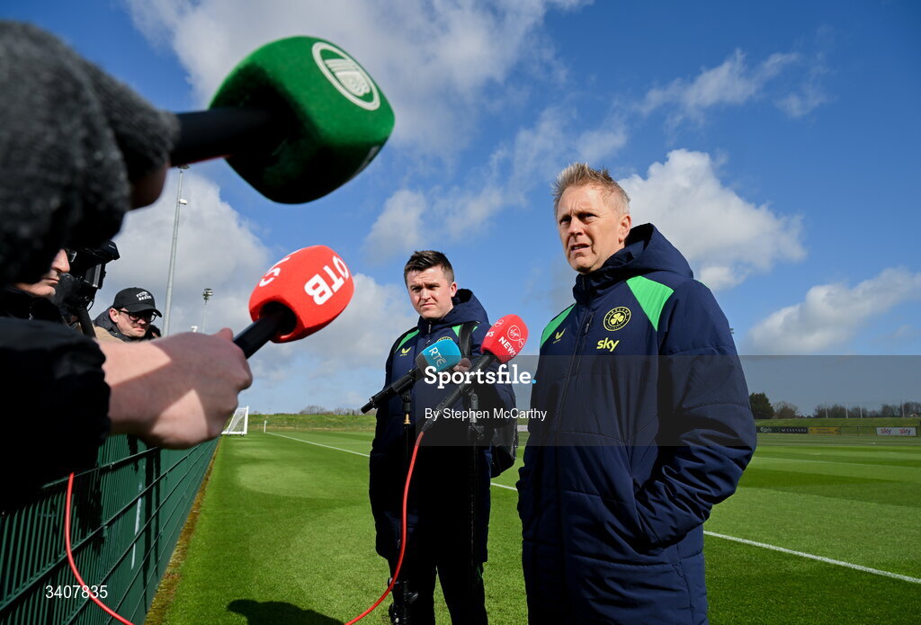 28 March 2026; Head coach Heimir Hallgrimsson speaks to media, accompanied by communications manager Kieran Crowley, before a Republic of Ireland men's training session at the FAI National Training Centre in Abbotstown, Dublin. Photo by Stephen McCarthy/Sportsfile
