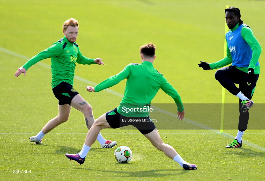28 March 2026; Bosun Lawal, right, with Liam Scales, left, and Johnny Kenny during a Republic of Ireland men's training session at the FAI National Training Centre in Abbotstown, Dublin. Photo by Stephen McCarthy/Sportsfile