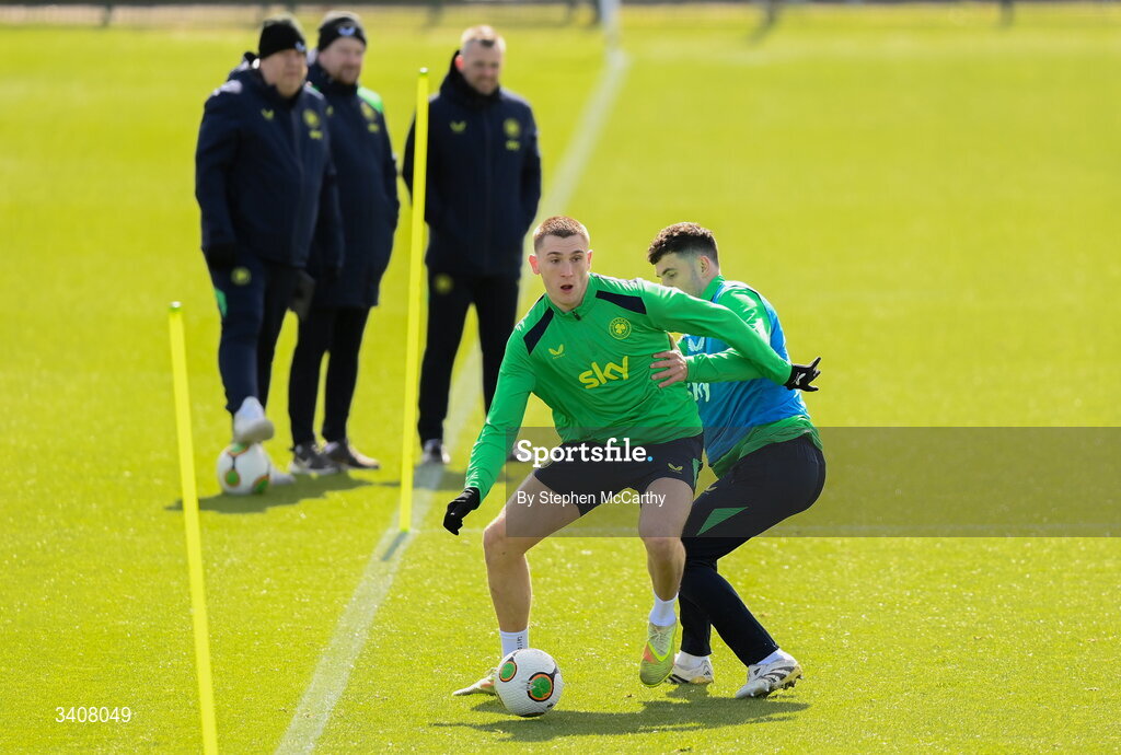 28 March 2026; Jimmy Dunne is tackled by John Egan during a Republic of Ireland men's training session at the FAI National Training Centre in Abbotstown, Dublin. Photo by Stephen McCarthy/Sportsfile