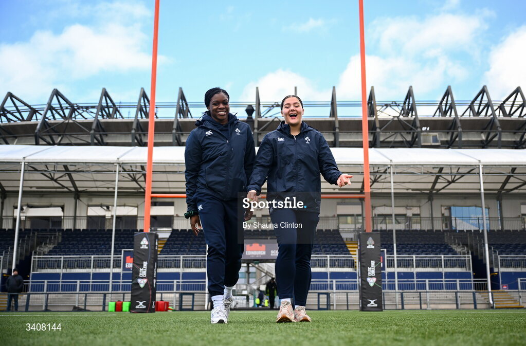 28 March 2026; Clovers players Faith Oviawe, left, and Jemima Adams Verling walk the pitch ahead of the Celtic Challenge final match between Wolfhounds and Clovers at The Hive Stadium in Edinburgh, Scotland. Photo by Shauna Clinton/Sportsfile
