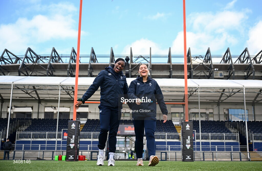 28 March 2026; Clovers players Faith Oviawe, left, and Jemima Adams Verling walk the pitch ahead of the Celtic Challenge final match between Wolfhounds and Clovers at The Hive Stadium in Edinburgh, Scotland. Photo by Shauna Clinton/Sportsfile