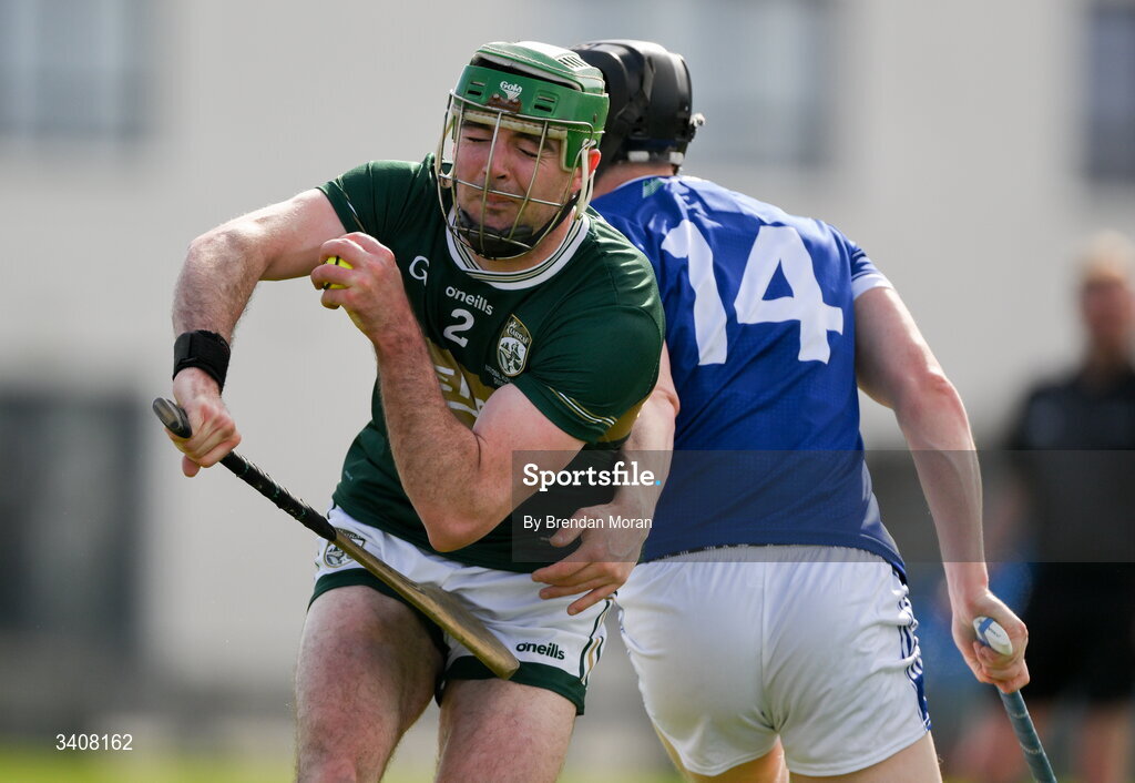 28 March 2026; Eric Leen of Kerry is tackled by Aaron Dunphy of Laois during the Allianz Hurling League Division 2 final match between Laois and Kerry at Laois Hire O'Moore Park in Portlaoise, Laois. Photo by Brendan Moran/Sportsfile