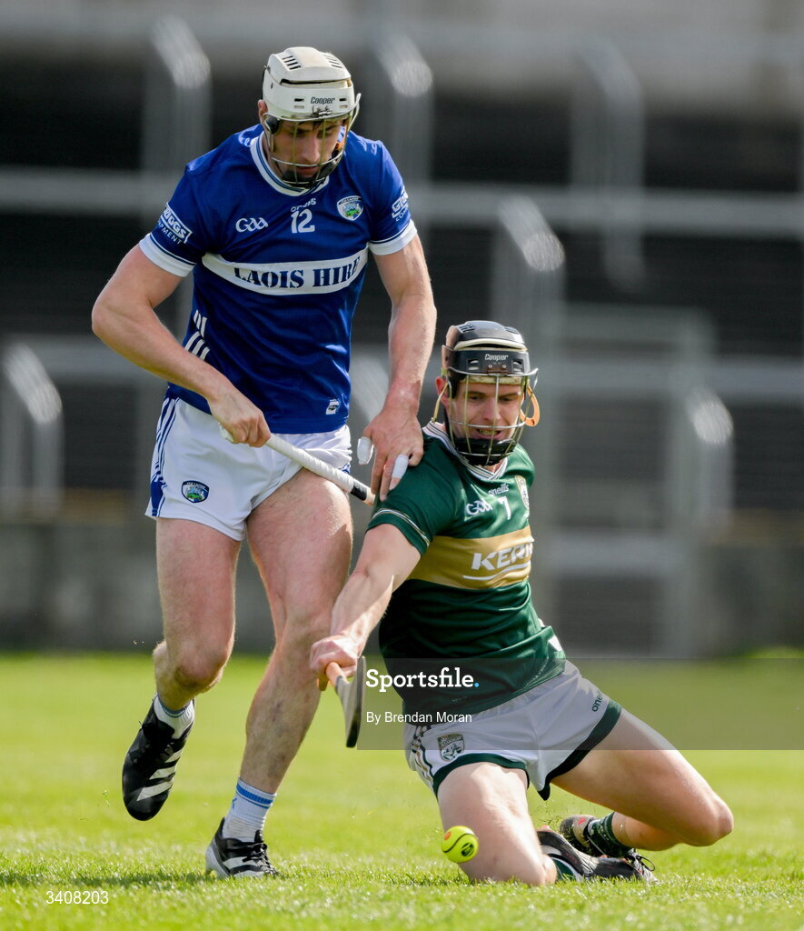 28 March 2026; Ryan Mullaney of Laois and Michael Leane of Kerry contest a loose sliotar during the Allianz Hurling League Division 2 final match between Laois and Kerry at Laois Hire O'Moore Park in Portlaoise, Laois. Photo by Brendan Moran/Sportsfile