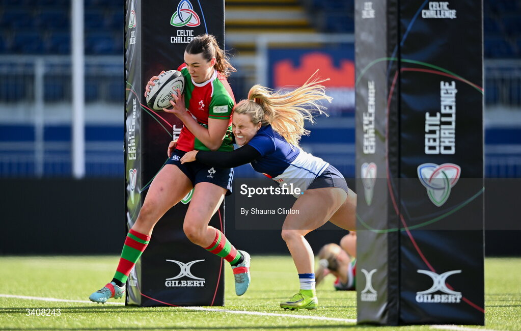 28 March 2026; Niamh Murphy of Clovers scores her side's first try despite the tackle of Aoife Dalton of Wolfhounds during the Celtic Challenge final match between Wolfhounds and Clovers at The Hive Stadium in Edinburgh, Scotland. Photo by Shauna Clinton/Sportsfile