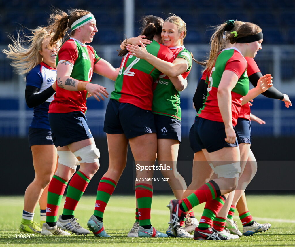 28 March 2026; Niamh Murphy, centre, of Clovers is congratulated by team-mates after scoring her side's first try during the Celtic Challenge final match between Wolfhounds and Clovers at The Hive Stadium in Edinburgh, Scotland. Photo by Shauna Clinton/Sportsfile