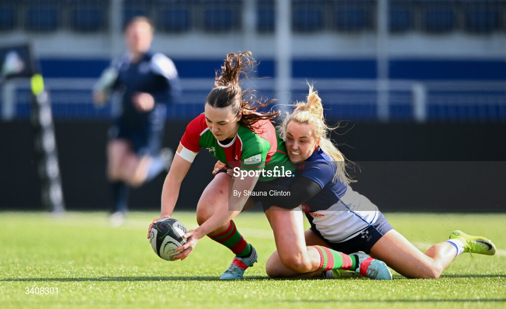 28 March 2026; Niamh Murphy of Clovers scores her side's first try despite the tackle of Aoife Dalton of Wolfhounds during the Celtic Challenge final match between Wolfhounds and Clovers at The Hive Stadium in Edinburgh, Scotland. Photo by Shauna Clinton/Sportsfile