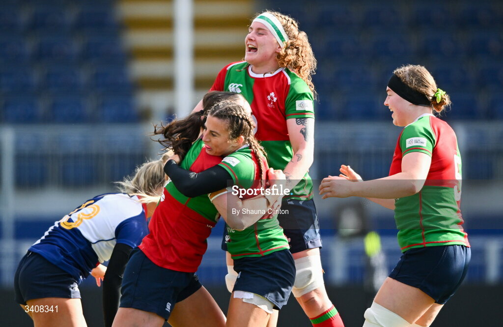 28 March 2026; Niamh Murphy of Clovers, centre, is congratulated by team-mates after scoring her side's first try during the Celtic Challenge final match between Wolfhounds and Clovers at The Hive Stadium in Edinburgh, Scotland. Photo by Shauna Clinton/Sportsfile