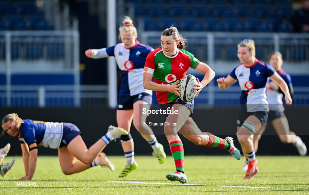 28 March 2026; Niamh Murphy of Clovers makes a break on her way to scoring her side's first try during the Celtic Challenge final match between Wolfhounds and Clovers at The Hive Stadium in Edinburgh, Scotland. Photo by Shauna Clinton/Sportsfile