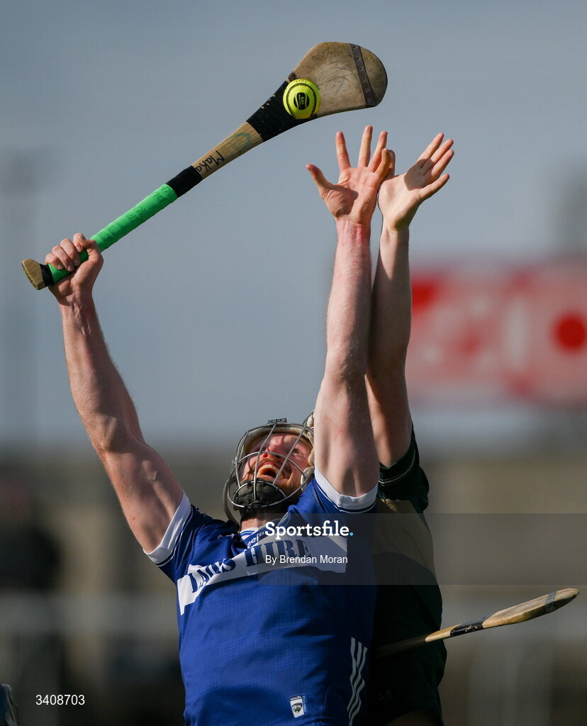 28 March 2026; Ciaran McEvoy of Laois and Tom Doyle of Kerry contest a dropping ball during the Allianz Hurling League Division 2 final match between Laois and Kerry at Laois Hire O'Moore Park in Portlaoise, Laois. Photo by Brendan Moran/Sportsfile