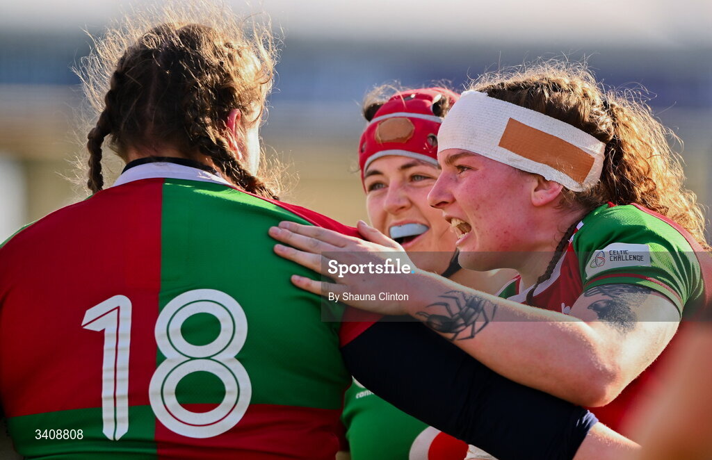 28 March 2026; Eilís Cahill of Clovers, left, is congratulated by team-mates Siobhán McCarthy, centre, and Ruth Campbell after scoring their side's third try during the Celtic Challenge final match between Wolfhounds and Clovers at The Hive Stadium in Edinburgh, Scotland. Photo by Shauna Clinton/Sportsfile