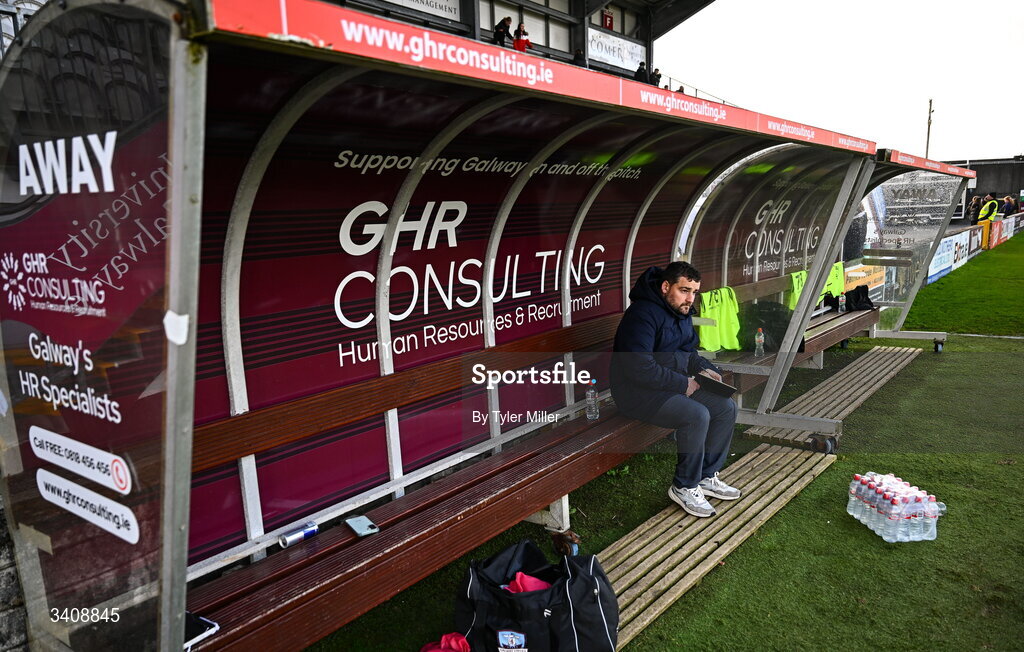 28 March 2026; Galway United manager Phil Trill makes notes from the bench before the SSE Airtricity Women's Premier Division match between Galway United and Wexford at Eamonn Deacy Park in Galway. Photo by Tyler Miller/Sportsfile