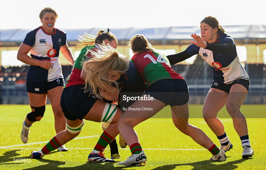 28 March 2026; Aoife Dalton of Wolfhounds is tackled by Clovers players Annakate Cournane, left, and Anna McGann during the Celtic Challenge final match between Wolfhounds and Clovers at The Hive Stadium in Edinburgh, Scotland. Photo by Shauna Clinton/Sportsfile