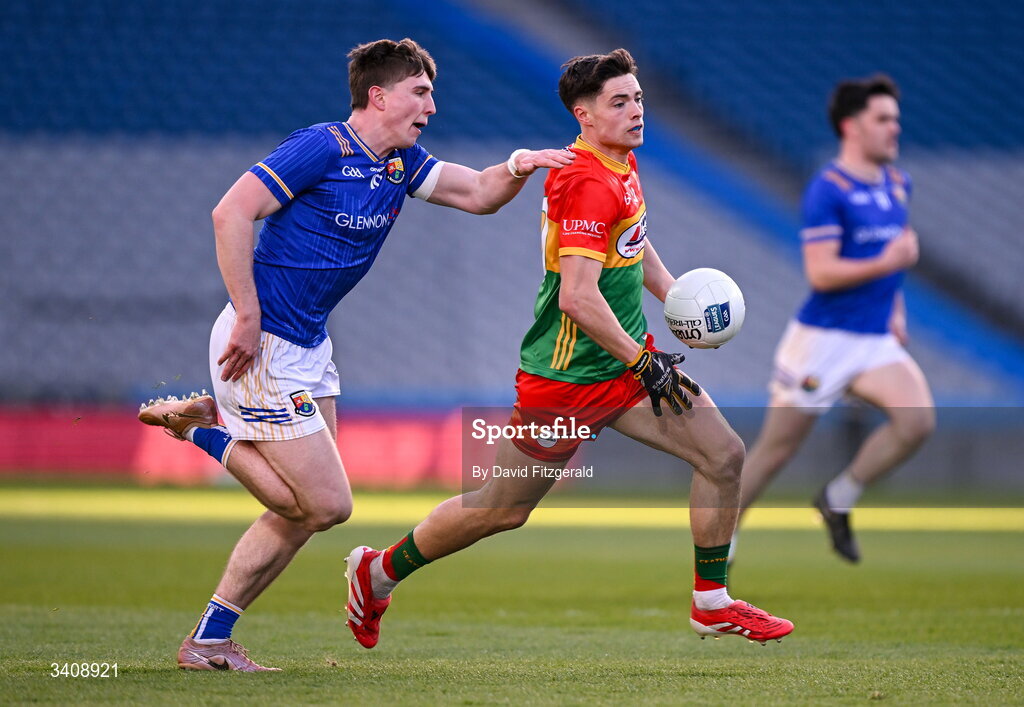 28 March 2026; Paddy McDonnell of Carlow in action against James Moran of Longford during the Allianz Football League Division 4 final match between Carlow and Longford at Croke Park in Dublin. Photo by David Fitzgerald/Sportsfile