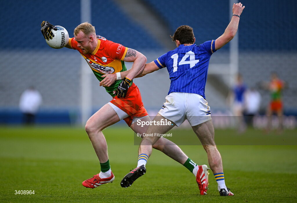 28 March 2026; Conor Doyle of Carlow in action against Joseph Hagan of Longford during the Allianz Football League Division 4 final match between Carlow and Longford at Croke Park in Dublin. Photo by David Fitzgerald/Sportsfile