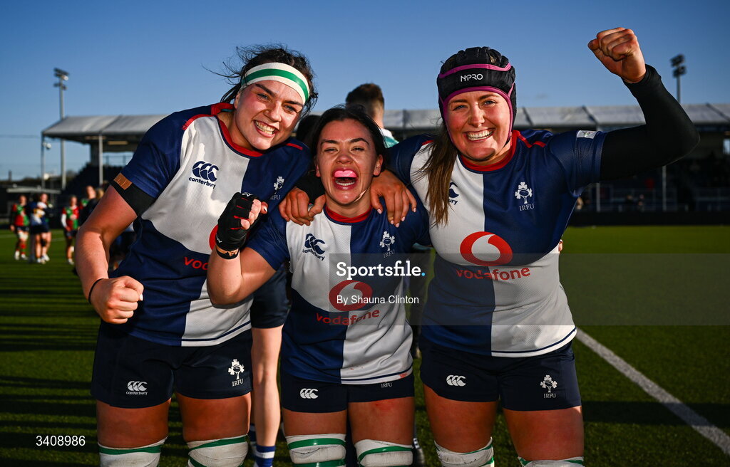 28 March 2026; Wolfhounds players, from left, Kate Jordan, Maeve Óg O'Leary and Fiona Tuite celebrate after their side's victory in the Celtic Challenge final match between Wolfhounds and Clovers at The Hive Stadium in Edinburgh, Scotland. Photo by Shauna Clinton/Sportsfile