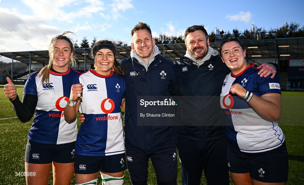 28 March 2026; Wolfhounds head coach Neil Alcorn, centre left, and assistant coach Ben Martin, centre right, with players, from left, Stacey Flood, Erin King and Hannah Wilson after the Celtic Challenge final match between Wolfhounds and Clovers at The Hive Stadium in Edinburgh, Scotland. Photo by Shauna Clinton/Sportsfile