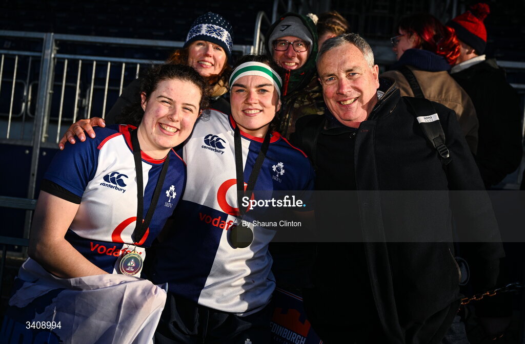 28 March 2026; Wolfhounds players Abby Moyles, left, and Kate Jordan with friends and family after the Celtic Challenge final match between Wolfhounds and Clovers at The Hive Stadium in Edinburgh, Scotland. Photo by Shauna Clinton/Sportsfile