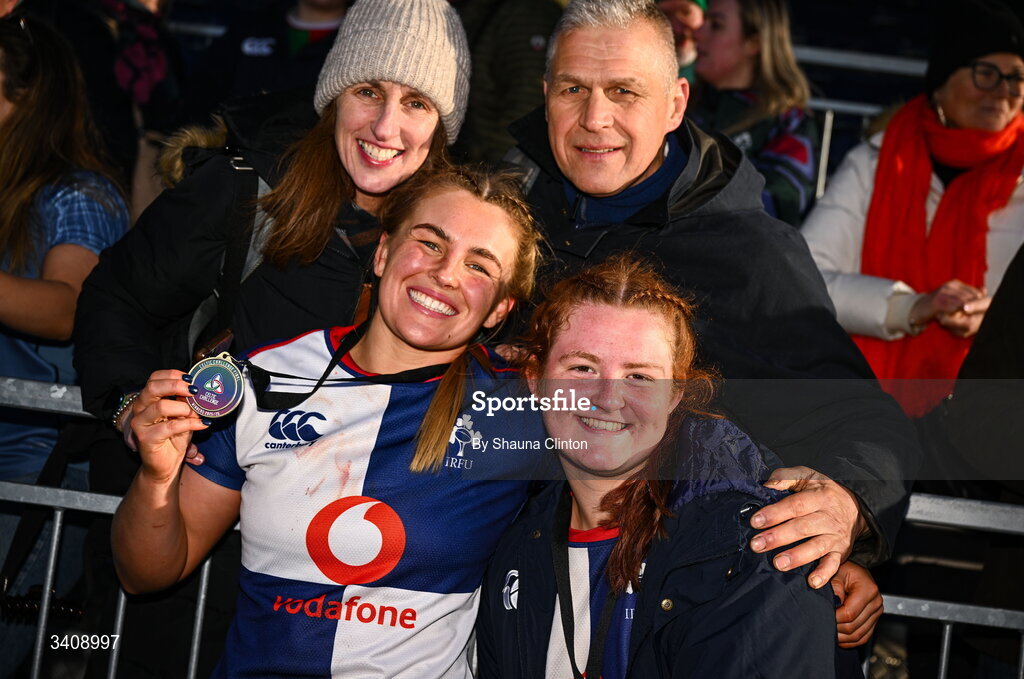 28 March 2026; Wolfhounds players India Daley, left, and Sophie Barrett with friends and family after the Celtic Challenge final match between Wolfhounds and Clovers at The Hive Stadium in Edinburgh, Scotland. Photo by Shauna Clinton/Sportsfile