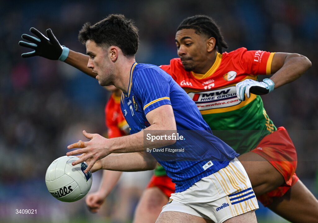 28 March 2026; Matthew Carey of Longford in action against John Phiri of Carlow during the Allianz Football League Division 4 final match between Carlow and Longford at Croke Park in Dublin. Photo by David Fitzgerald/Sportsfile